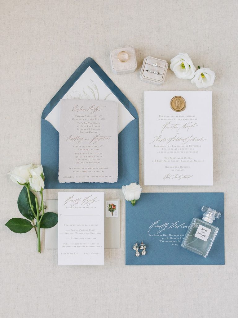 blue wedding invitation flat lay