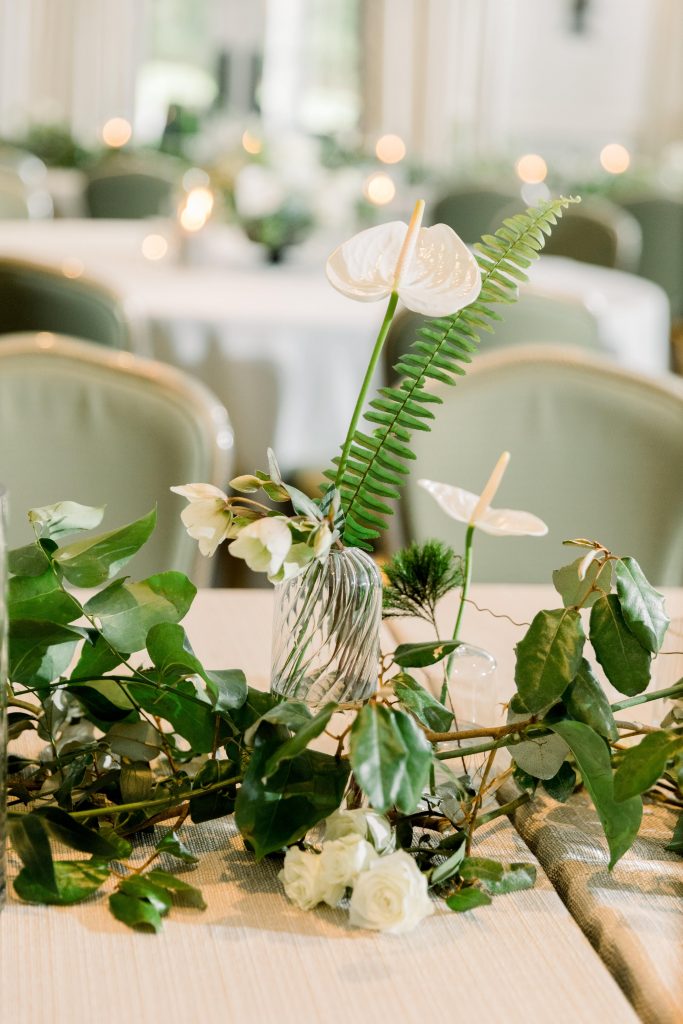 White flower bud vases with orchids