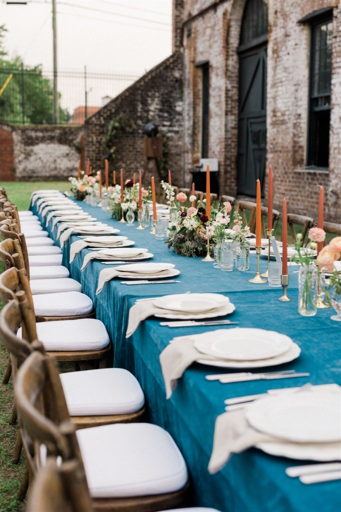 wedding table setting with turquoise and peach