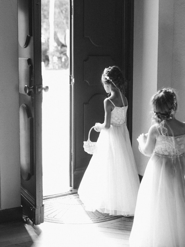 black and white photo of flower girls