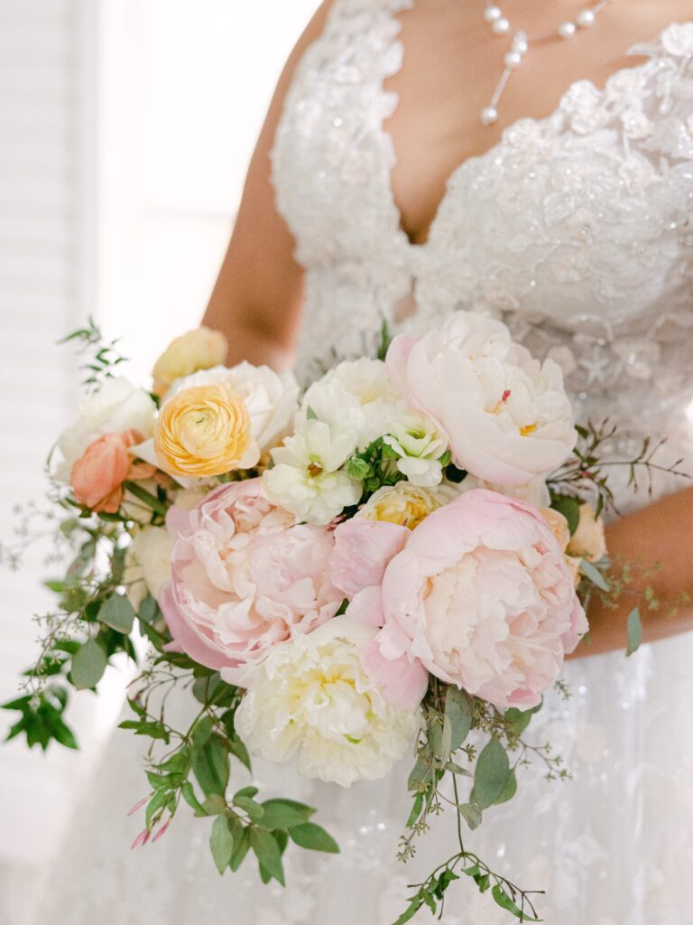Pastel bridal bouquet with peonies
