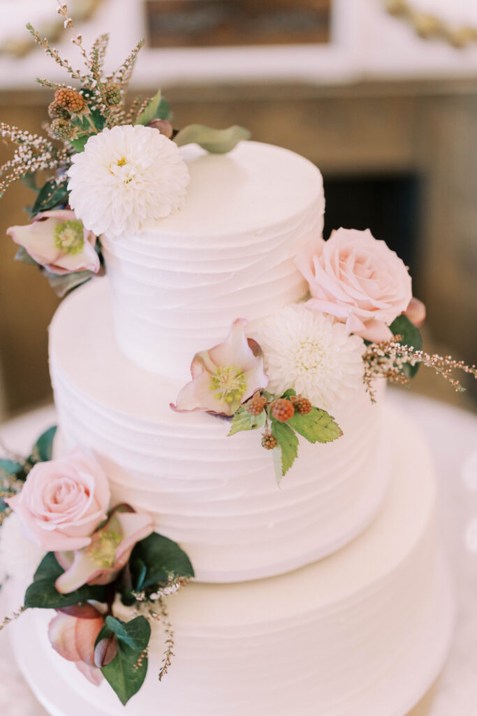 Buttercream wedding cake with fresh flowers