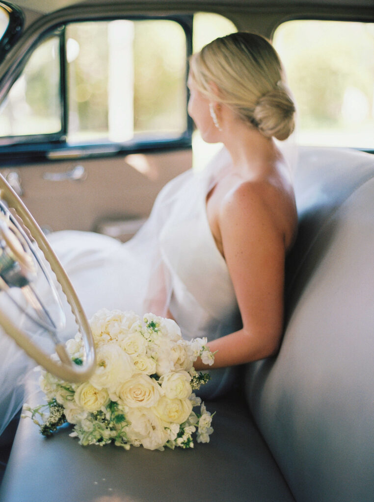 wedding portrait in vintage car